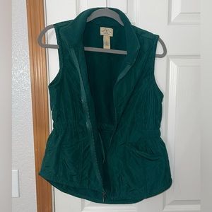 Slightly worn green vest